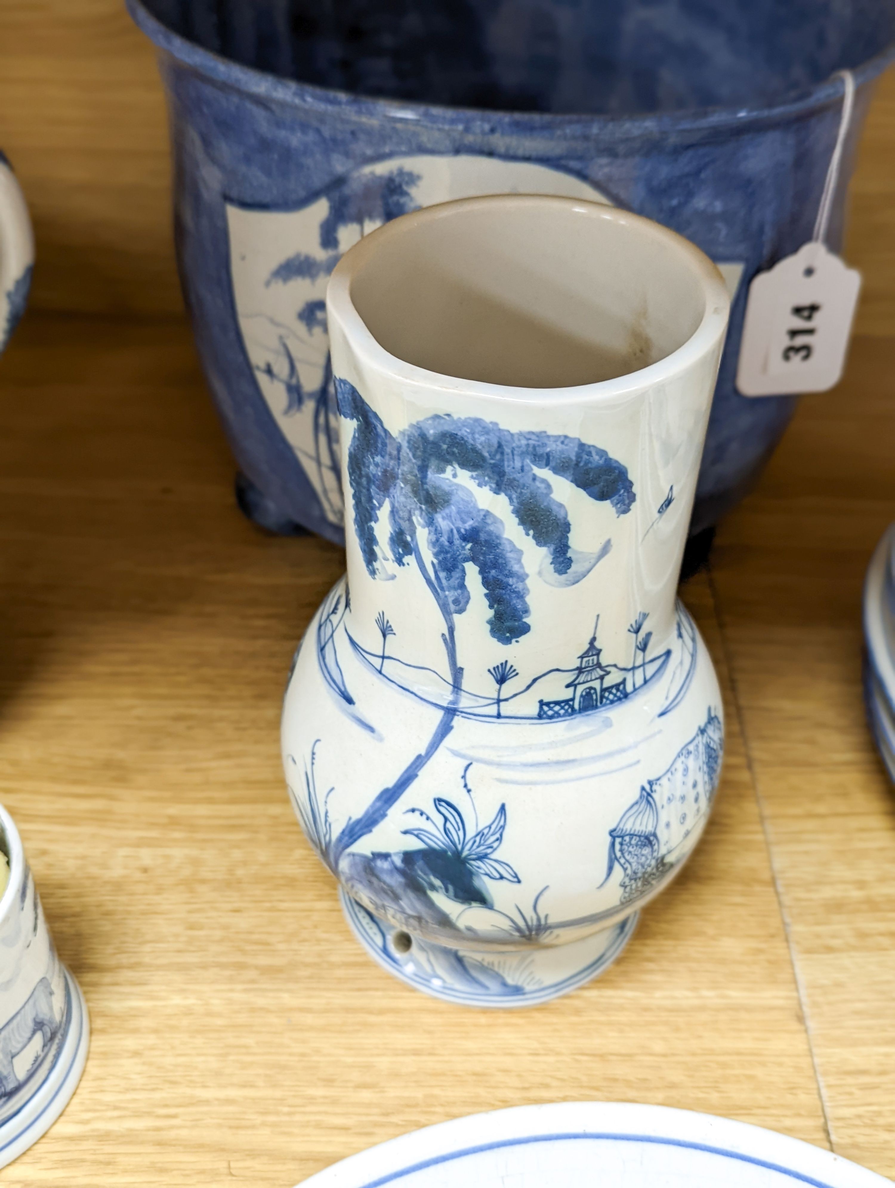 Isis pottery for Colefax and Fowler, a group of blue and white ceramics decorated in imitation of Bristol delftwares
